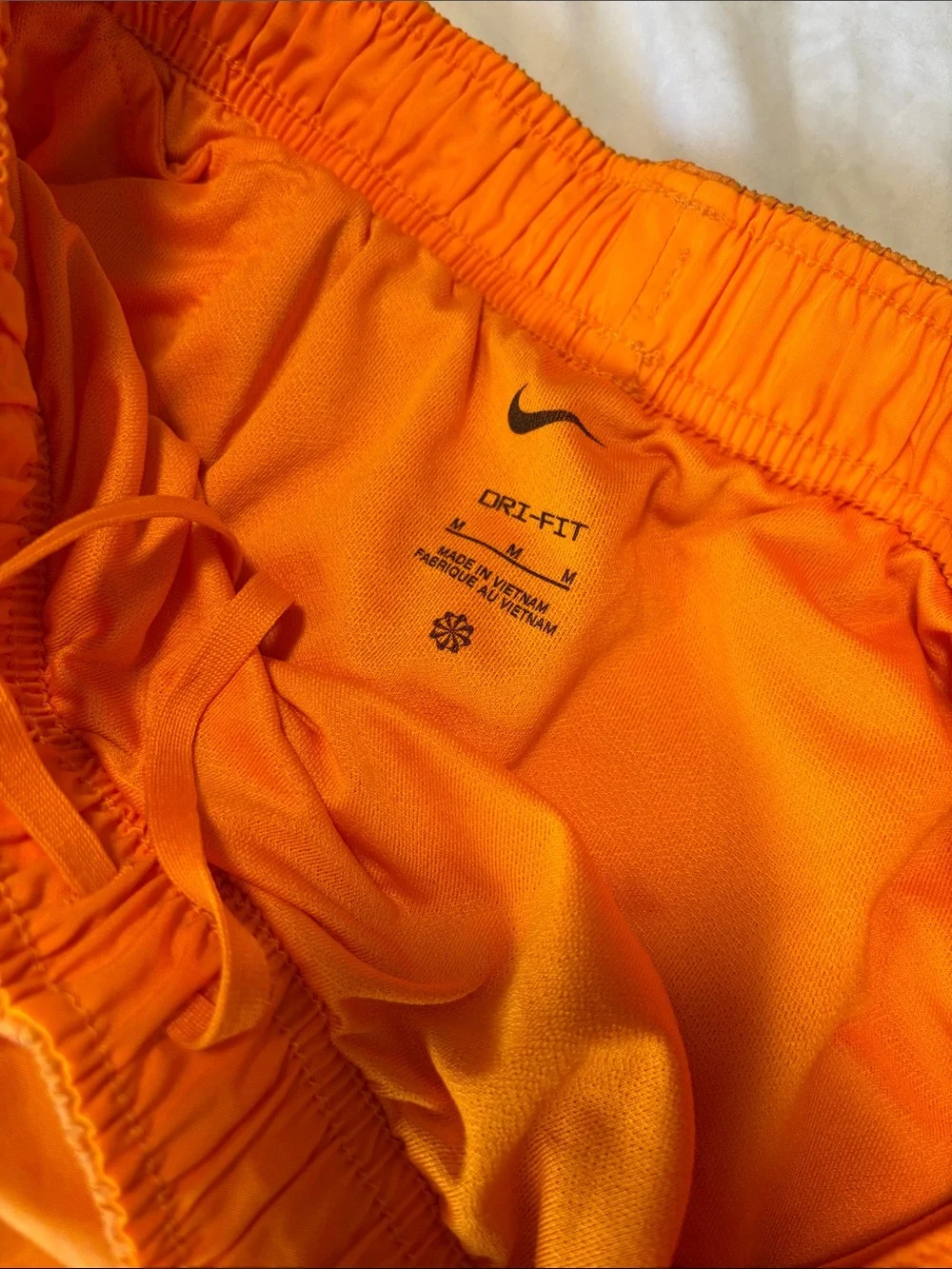 Nike Women's Bright Orange Athletic Shorts with Yellow Trim